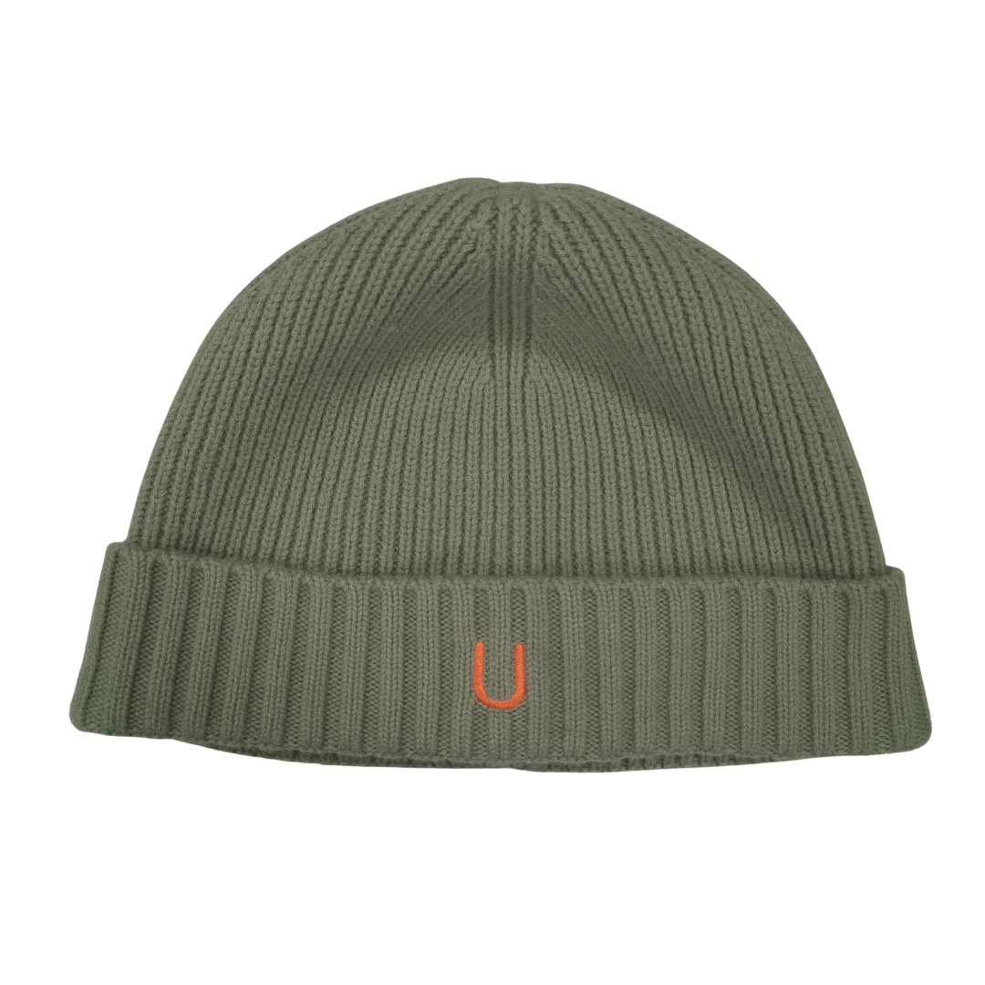 Front view of 100% merino wool eucalyptus green ribbed knit beanie with bright orange embroidered U logo